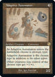 [Foil] Adaptive Automaton (Schematic) (64) (The Brothers' War: Retro Frame Artifacts)